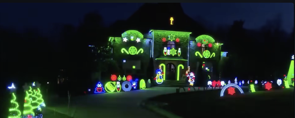 High Flying Lights Christmas display lit up at night, as featured on Queen City News